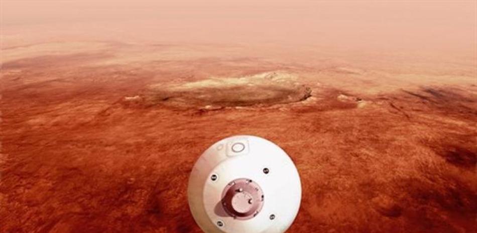 El aerocaparazón que contiene el rover Perseverance de la NASA se guía hacia la superficie marciana a medida que desciende a través de la atmósfera en esta ilustración. 

Foto: NASA/JPL-CALTECH