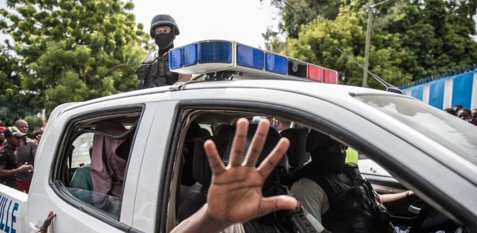 La policía haitiana en una foto publicada ayer jueves, 8 de julio, por la agencia de noticias AFP.