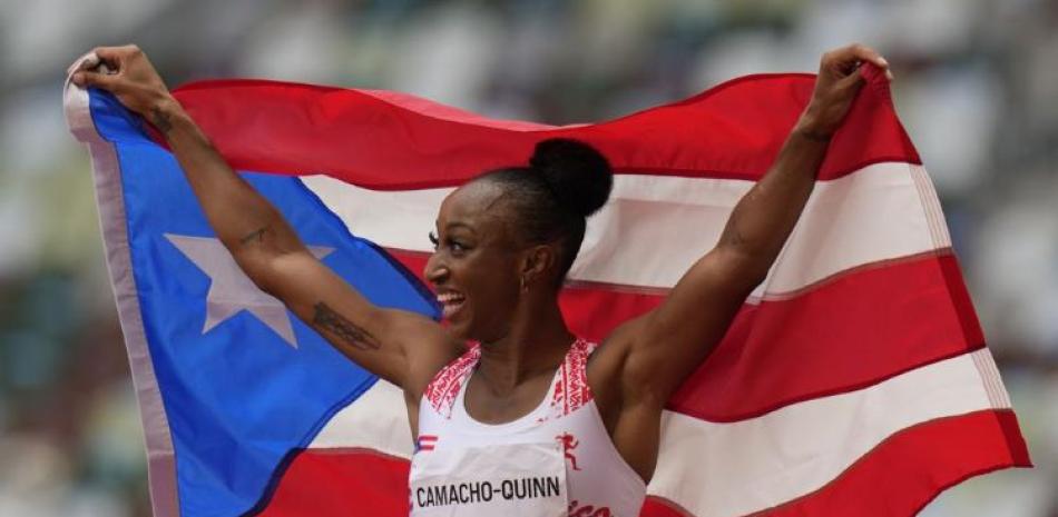 El puertorriqueña Jasmine Camacho-Quinn reacciona tras ganar la final de los 100 metros con vallas femeninos de los Juegos Olímpicos de Tokio.