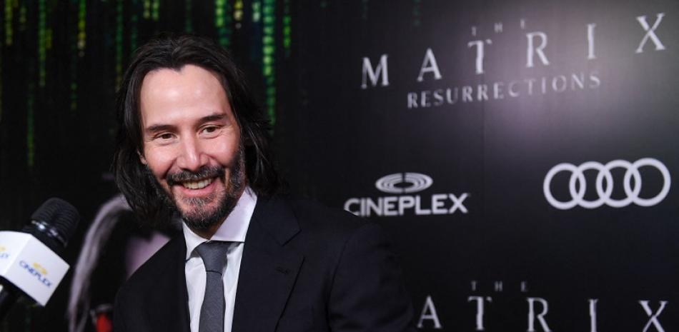 El actor Keanu Reeves asiste al estreno canadiense de "The Matrix Resurrections" que se llevó a cabo en el Scotiabank Theatre de Cineplex el 16 de diciembre de 2021 en Toronto, Ontario.  AFP