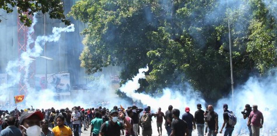 El suceso tuvo lugar horas después de que miles de manifestantes irrumpieran en las residencias oficiales del presidente de Sri Lanka/ AFP