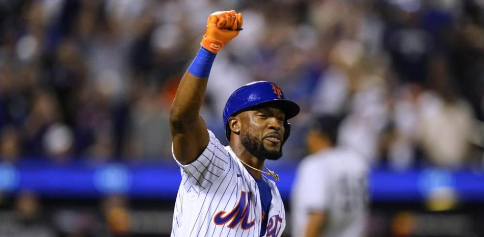 El dominicano Starling Marte, de los Mets de Nueva York, celebra luego de batear un sencillo productor en el juego del miércoles ante los Yanquis.