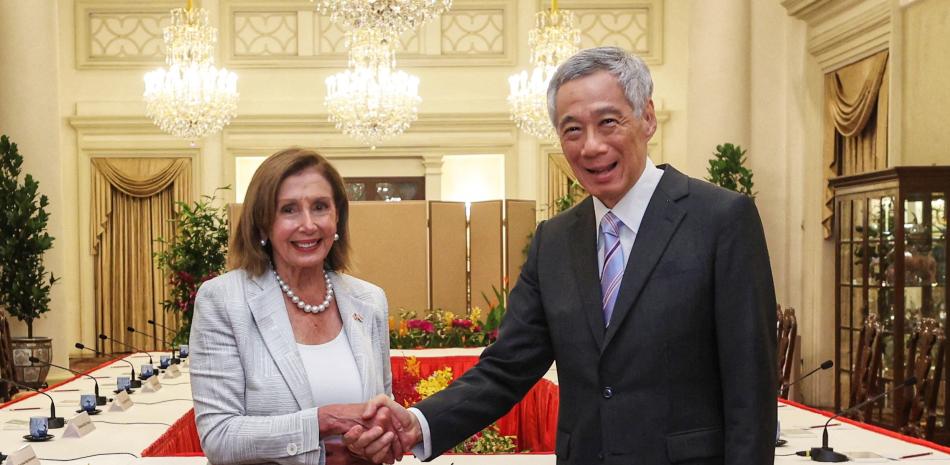 Nancy Pelosi y el primer ministro de Singapur, Lee Hsien Loong. Foto AFP