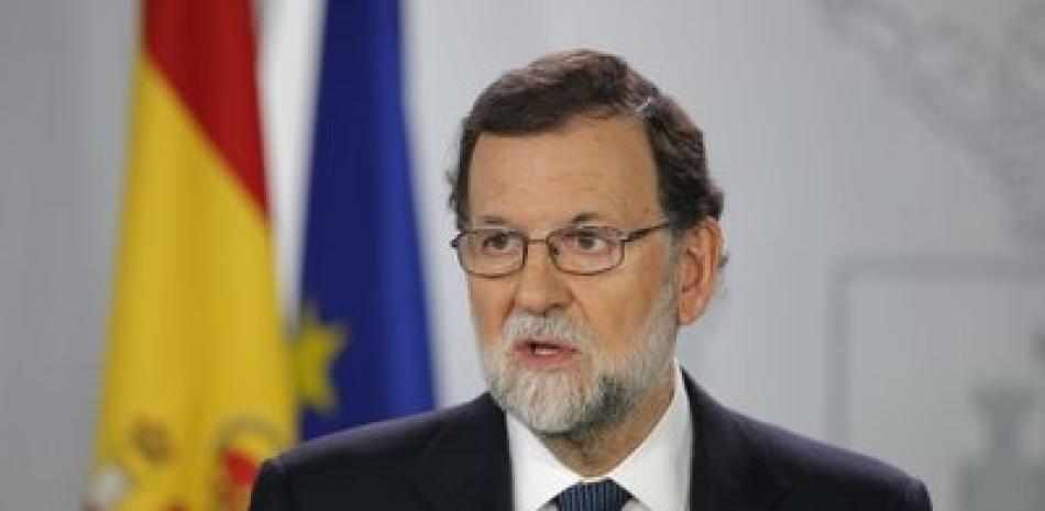 El gobierno español entonces estaba dirigido por el conservador Mariano Rajoy. ap