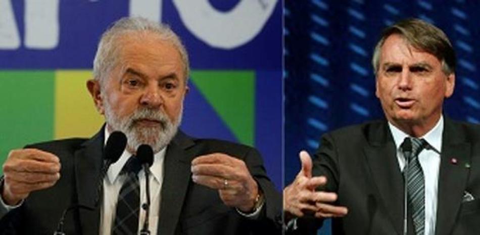 El  candidato presidencial brasileño Jair Bolsonaro y Lula da Silva durante una conferencia de prensa internacional. Foto AFP Forum.