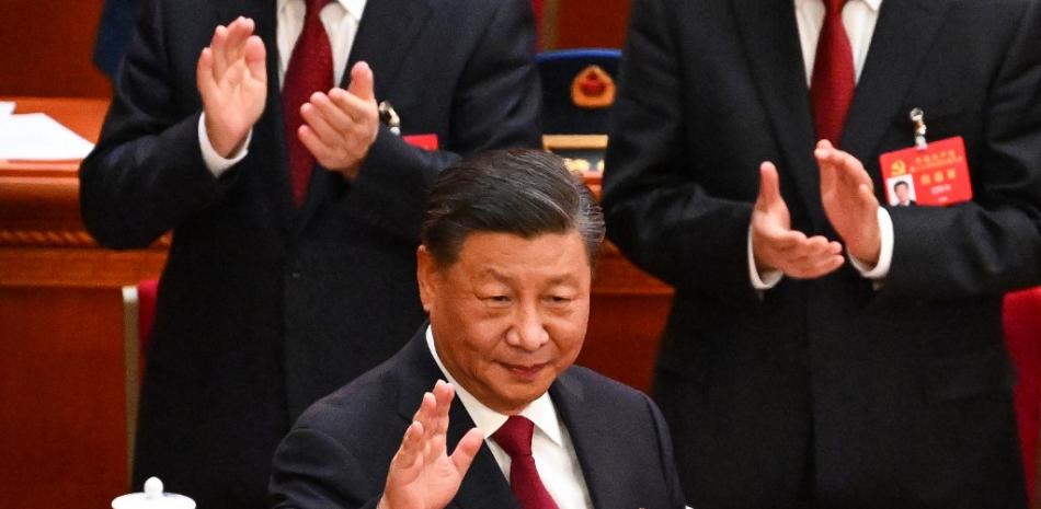 El presidente de China, Xi Jinping, llega a la sesión inaugural del 20º Congreso del Partido Comunista Chino en el Gran Salón del Pueblo en Beijing el 16 de octubre de 2022.
Noel CELIS / AFP