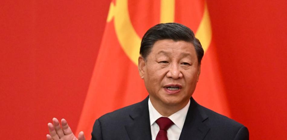 Xi Jinping, que asumió el poder en 2012, recibió un tercer mandato de cinco años como secretario general del Partido Comunista Chino . / AFP