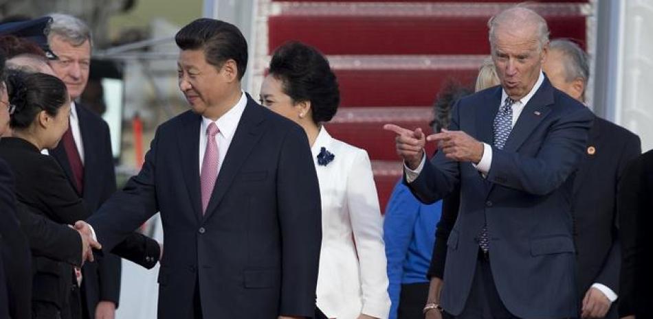 Xi Jimping y Biden.