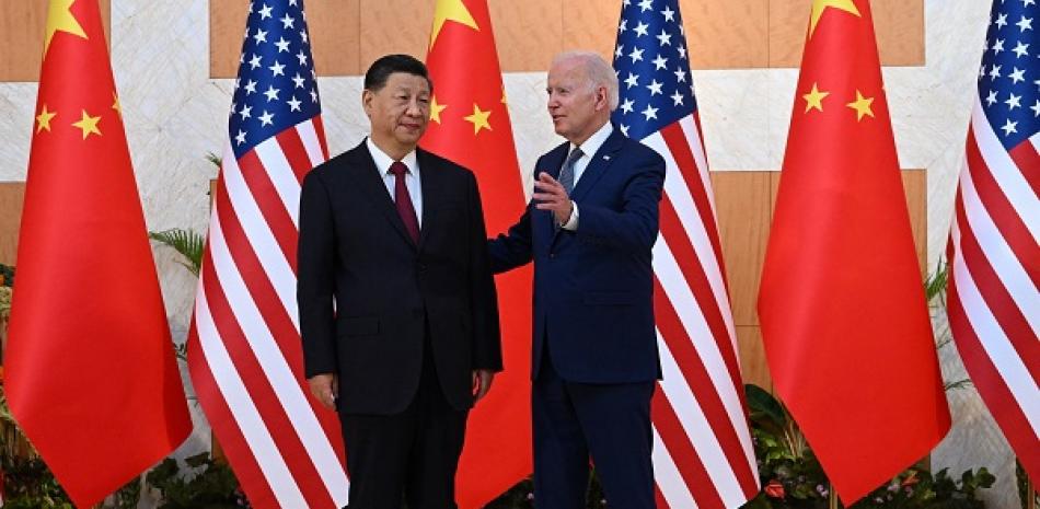 Xi Jinping y Joe Biden en el marco de celebración de la cumbre del G20. AFP
