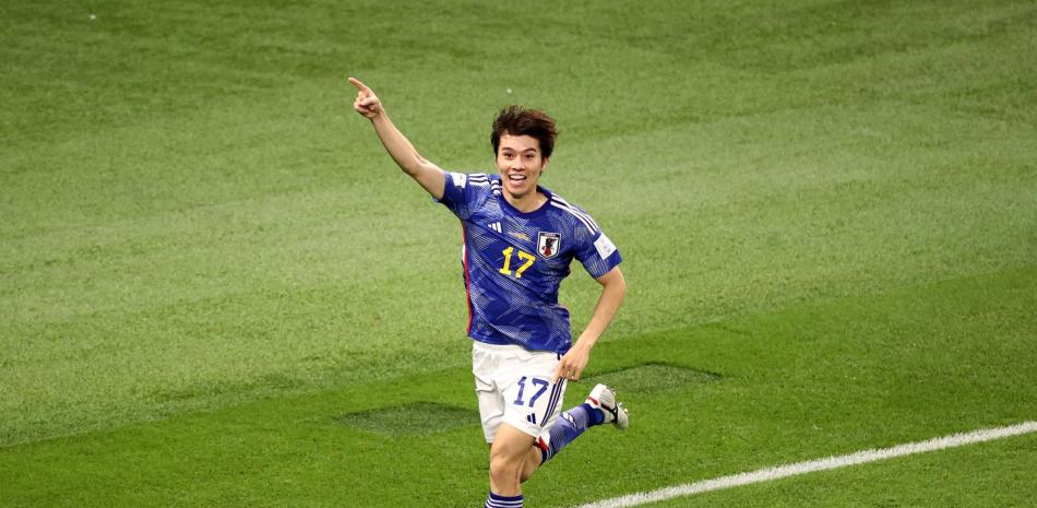 Ao Tanaka, de Japón, celebra tras anotar el gol de la victoria para su equipo en el partido frente a España en el Mundial de Fútbol Catar 2022.