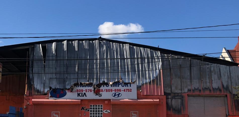 Local de negocio incendiado. 

Fotos de Listín Diario Santiago.