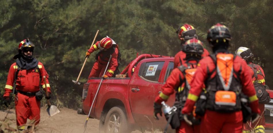 Bomberos en Chile. Foto: AFP