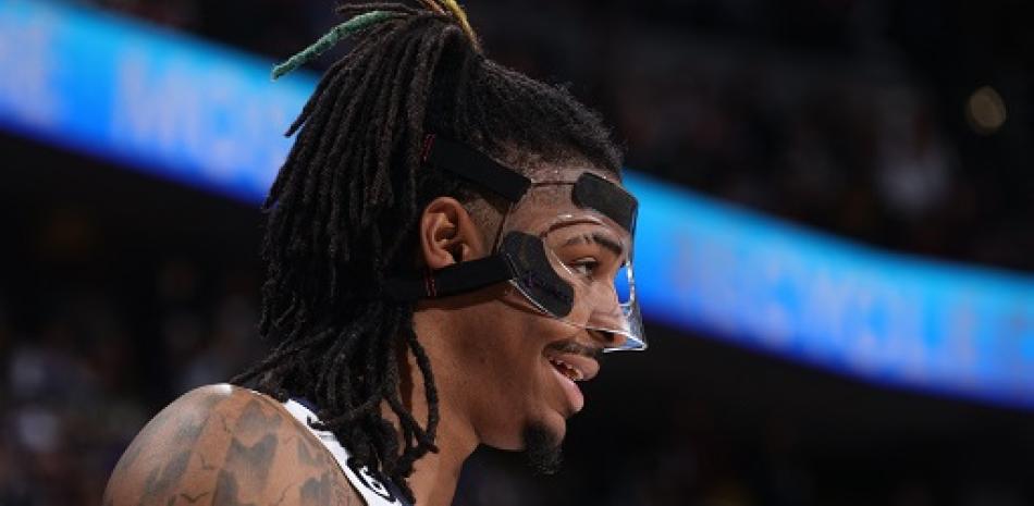 Ja Morant #12 de los Memphis Grizzlies sonríe durante el partido contra los Denver Nuggets el 3 de marzo de 2023 en el Ball Arena de Denver, Colorado.
Nathaniel S. Butler / NBAE / Getty Images / Getty Images vía AFP