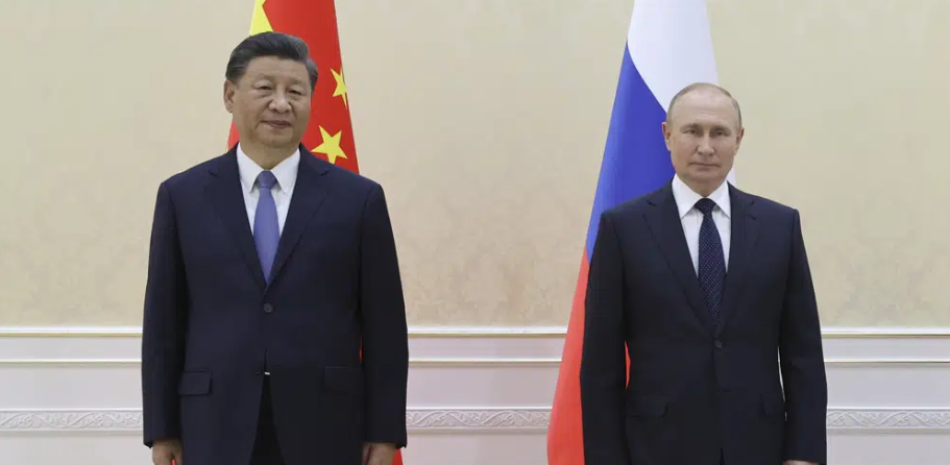 El presidente de China Xi Jinping y Putin. AP
