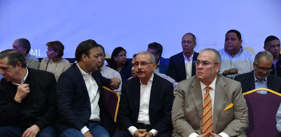 Danilo Medina, Abel Martínez y Charlie Mariotti en reunión del PLD. Foto: Jorge Martínez.