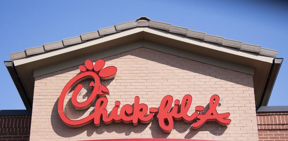 (FILES) Chick-fil-A chain restaurant in Middletown, Delaware, on July 26, 2019. The "Lord's chicken" no more: US fast food chain Chick-fil-A -- beloved among Americans for its sandwiches, nuggets and milkshakes -- found itself on the receiving end of right-wing ire this week, accused of succumbing to "woke" ideology. After conservative customers realized the company employs a "diversity, equity and inclusion" representative, it has joined the ranks of other seemingly innocuous brands now facing calls for boycotts, such as mega supermarket Target and Bud Light beer. (Photo by JIM WATSON / AFP)