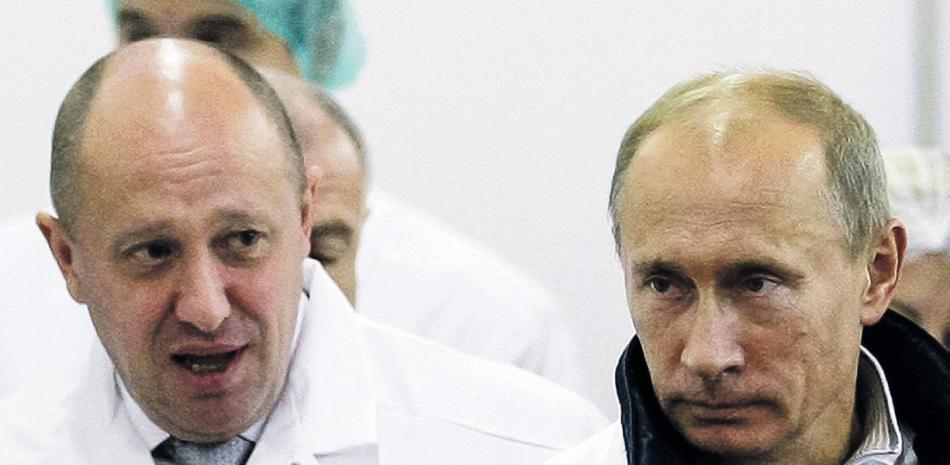 Yevgeny Prigozhim y Vladimir Putin, dos “buenos pejes” del “comercio”.