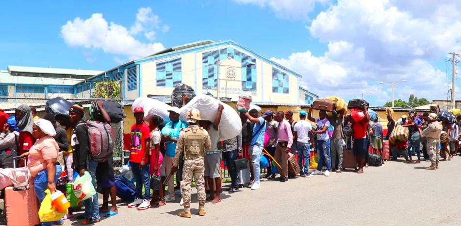 Haitianos en la frontera de Dajabón con Haití, especificamente en Juana Mendez, mientras realizaban el proceso migratorio para retornar a su país.