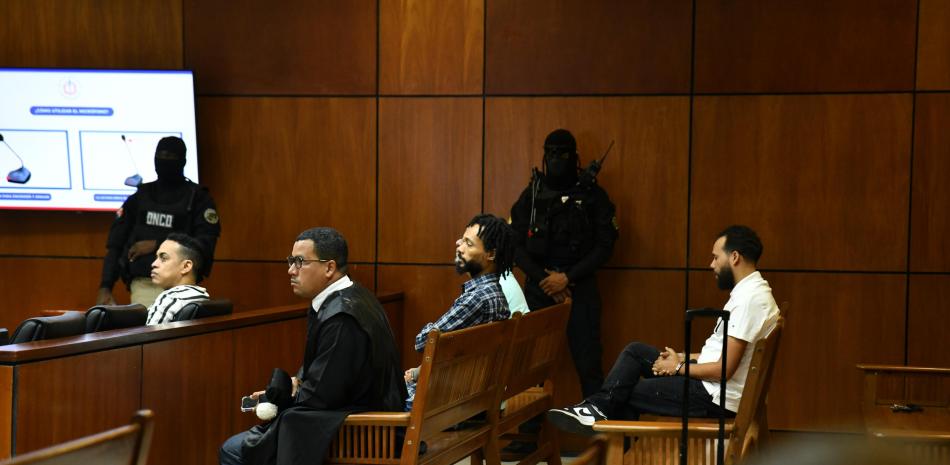 Rafael Ambiorix Rodríguez Guzmán y Felix Samuel Reynoso Ventura, vistos aquí en audiencia, optaron por irse voluntariamente en extradición a Estados Unidos.