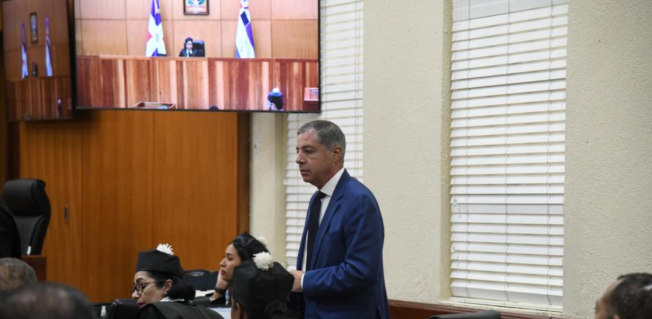 Donald Guerrero, exministro de Hacienda en la segunda administración de Danilo Medina, participa en la audiencia de seguimiento al caso Calamar en el Palacio de Justicia, este viernes.