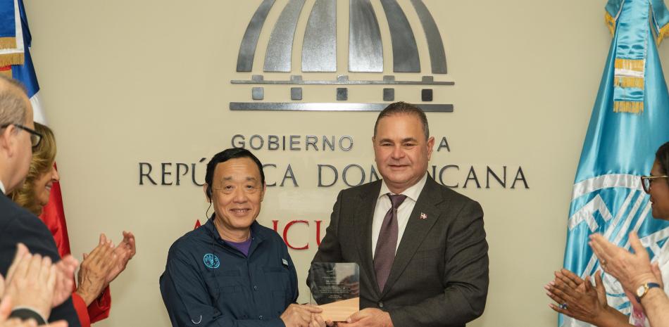 El ministro de agricultura, Francisco Oliverio Espaillat y el director general de la FAO, Qu Dongyu.