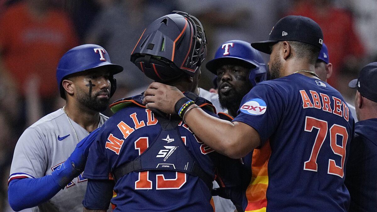 MLB: Adolis Garcia hits grand slam in seven-run fifth inning as Texas  Rangers rout Houston Astros 13-5 in testy game Wednesday