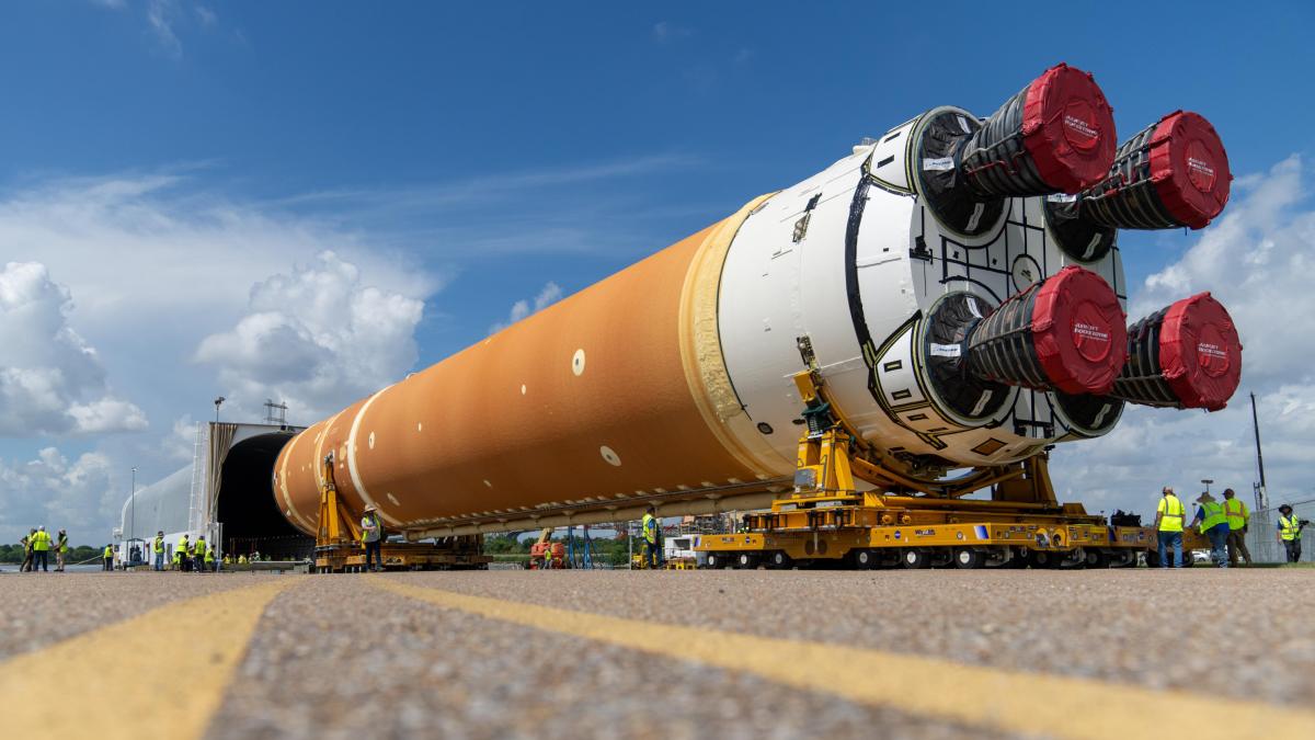 NASA rocket that will be used for the first manned mission to the moon leaves the factory