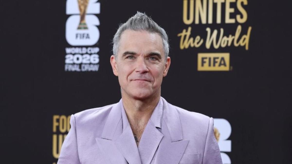 Robbie Williams supera a The Beatles con récord de álbumes número uno en el Reino Unido
