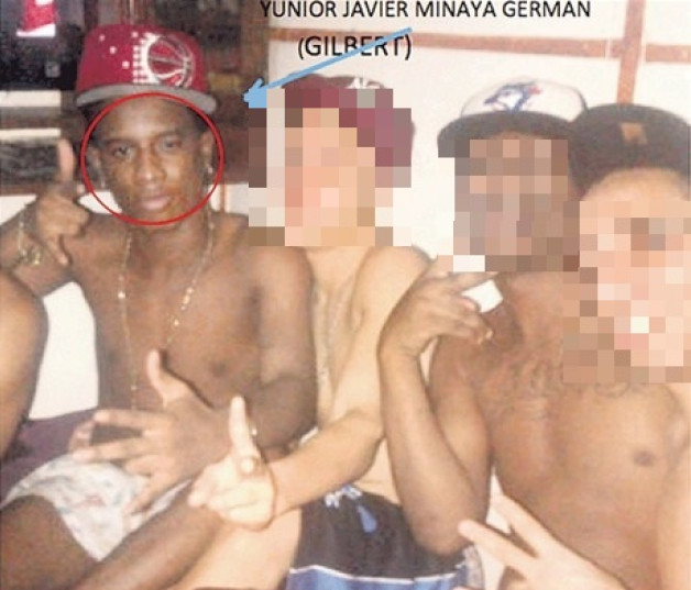 A la izquierda, identificado por el círculo, Junior Minaya Germán (Gilbert), quien murió en un enfrentamiento con la Policía en Ciudad Satélite, de Hato Nuevo.