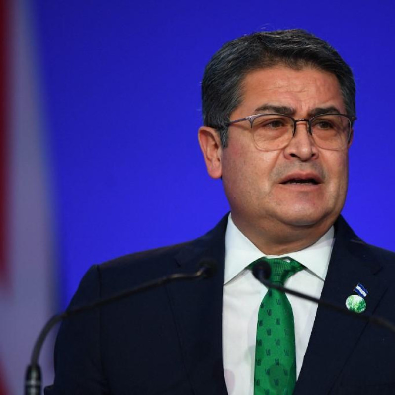 El presidente de Honduras, Juan Orlando Hernández, presenta su declaración nacional como parte de la Cumbre de Líderes Mundiales de la Conferencia de las Naciones Unidas sobre Cambio Climático COP26 en Glasgow, Escocia, el 1 de noviembre de 2021.