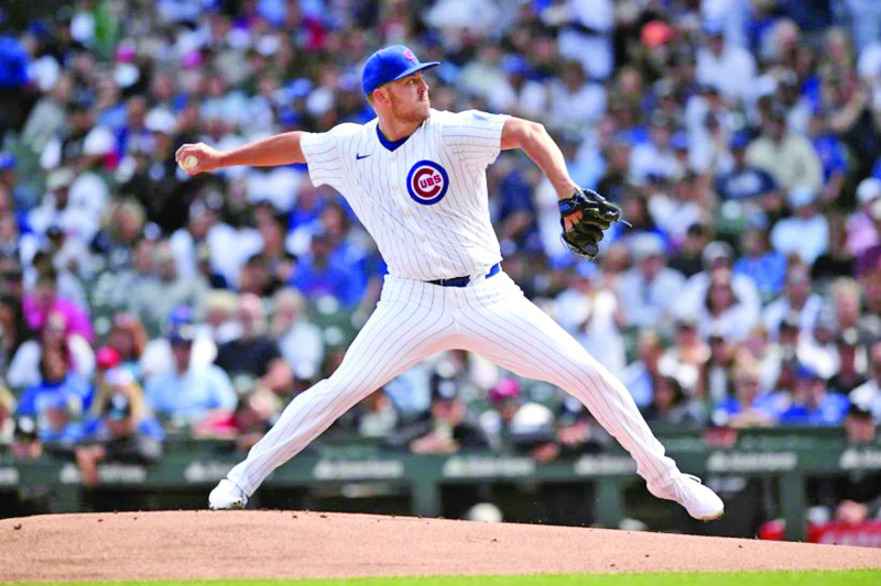 El abridor de los Cachorros de Chicago Jameson Taillon lanza en la primera entrada ante los Yankees.