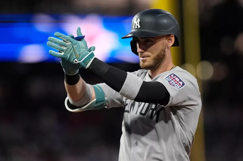 Cody Bellinger, de los Yankees, reacciona tras pegar un sencillo de dos carreras en la primera entrada del Juego de Estrellas de las Grandes Ligas, el 14 de julio del 2026.