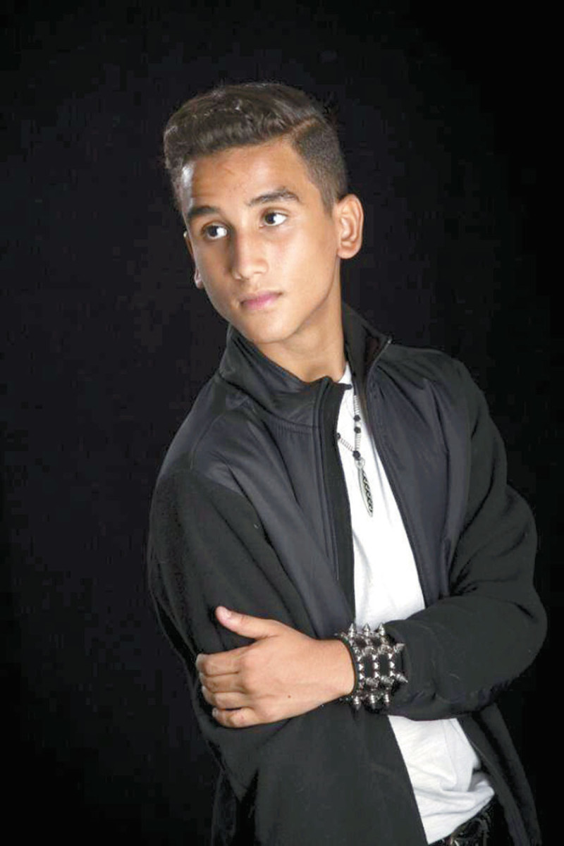 Cantante. Alejandro Enrique Coll, niño de 14 años que participó en el Idol Kids, siendo uno de los finalistas en este concurso.
