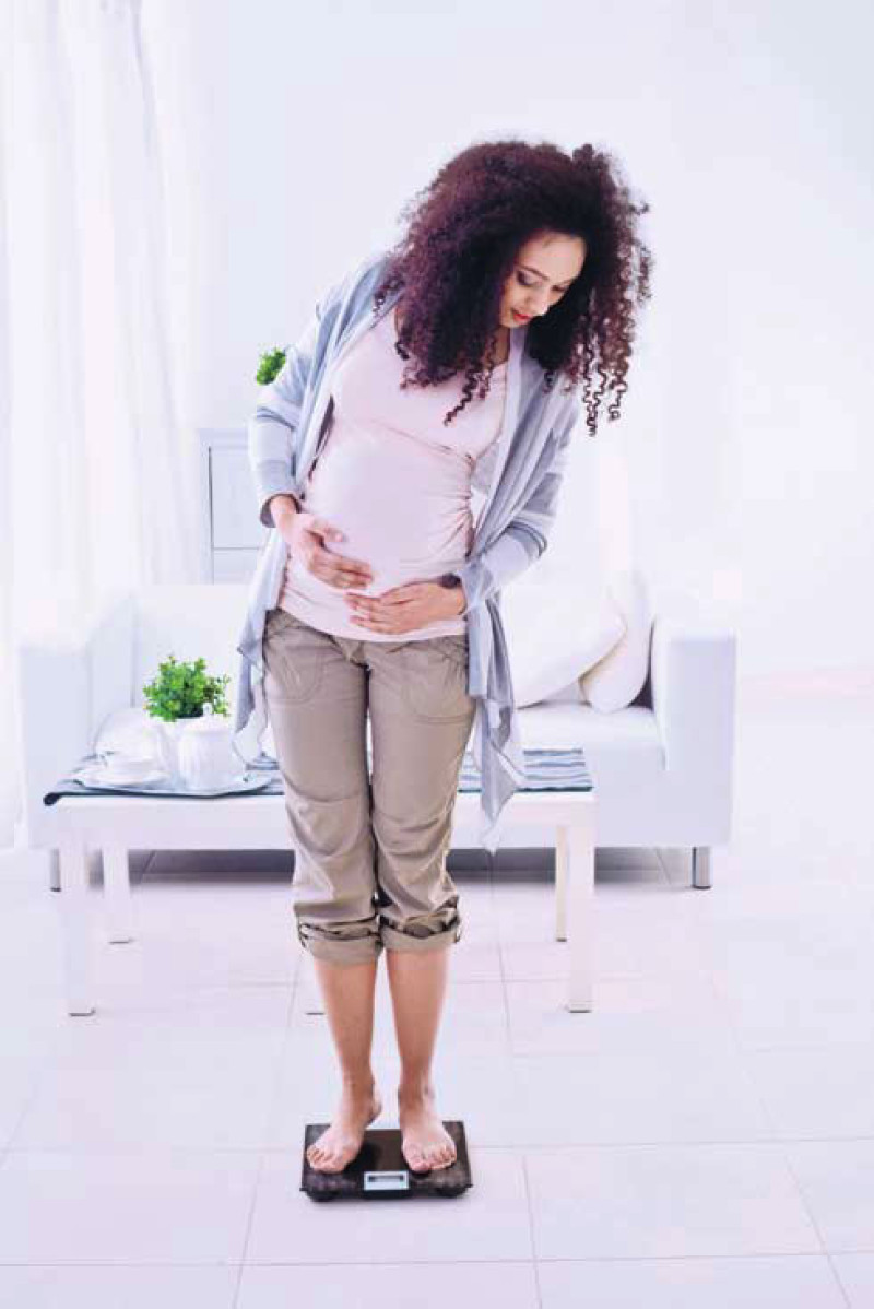 01 El aumento total normal de una mujer encinta es entre 14 a 20 libras.