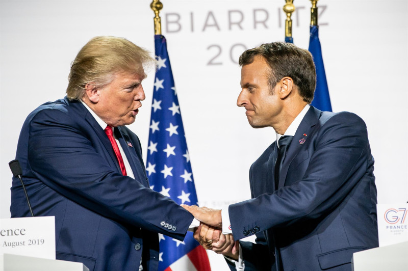 Donald Trump y Enmanuel Macron, AFP