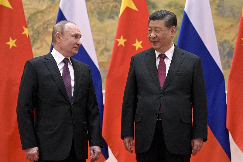 Presidente de Rusia, Vladimir Putin, junto a su homólogo chino, Xi Jinping.