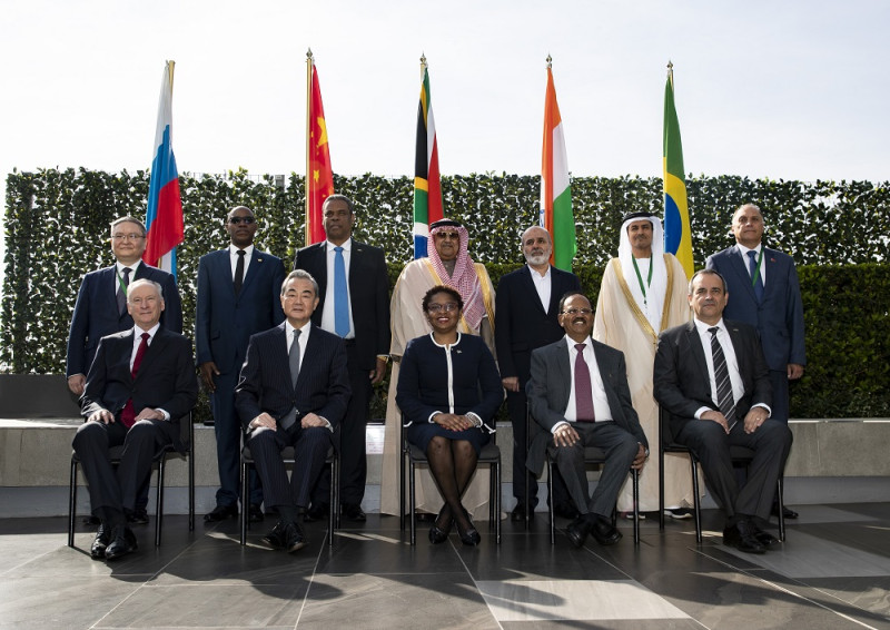Wang Yi (2nd L, front), a member of the Political Bureau of the Communist Party of China (CPC) Central Committee and director of the Office of the CPC Central Commission for Foreign Affairs, poses for a photo with the delegates of the 13th Meeting of BRICS National Security Advisers and High Representatives on National Security in Johannesburg, South Africa, July 24, 2023.