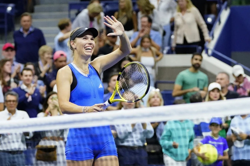 La danesa Caroline Wozniacki celebra tras derrotar a la checa Petra Kvitova en la segunda ronda del US Open, el miércoles en Nueva York.