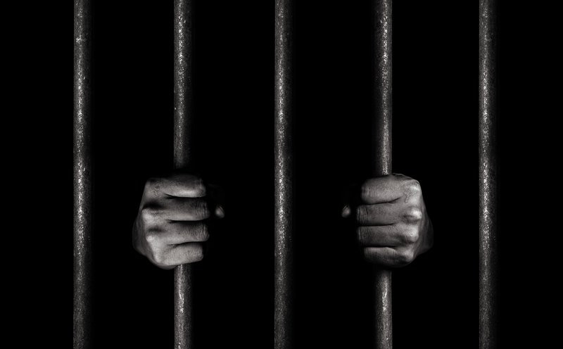 Foto ilustratriva de hombre en prisión.