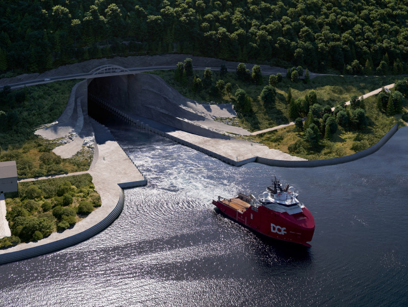 Navío de color rojo navegando fuera del túnel de Stad, en Moldefjord.
