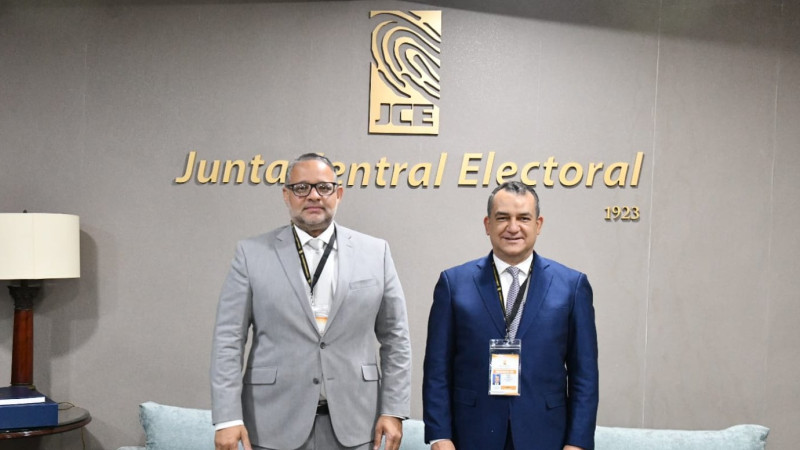 El procurador Feliz Rivas y el presidente de la JCE, Román Jáquez.