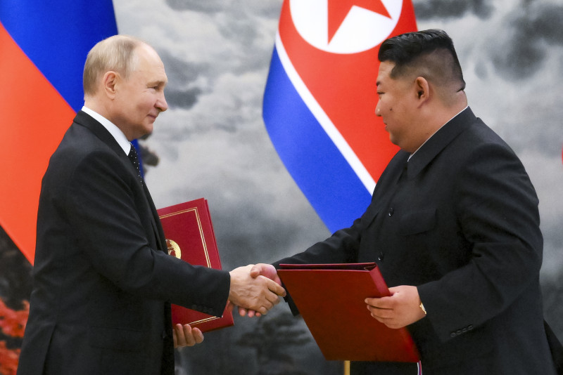 Vladimir Putin y Kim Jong Un