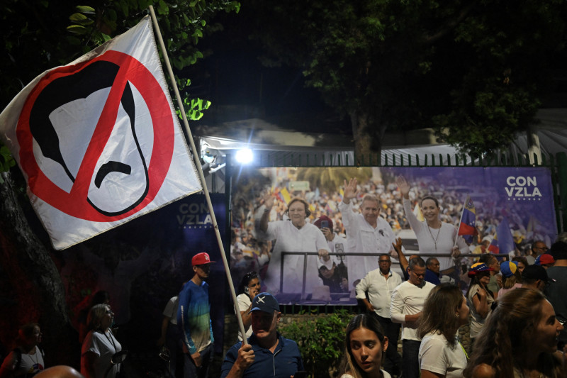 Venezolanos ocupan las calles en Venezuela para apoyar a la oposición.