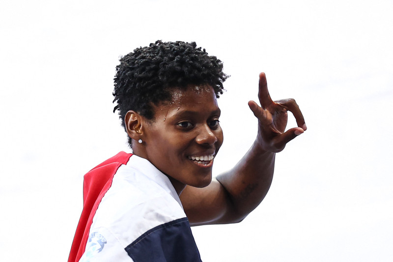 Dominican Republic's Marileidy Paulino celebrates after winning the women's 400m final of the athletics event at the Paris 2024 Olympic Games at Stade de France in Saint-Denis, north of Paris, on August 9, 2024. (Photo by Anne-Christine POUJOULAT / AFP)