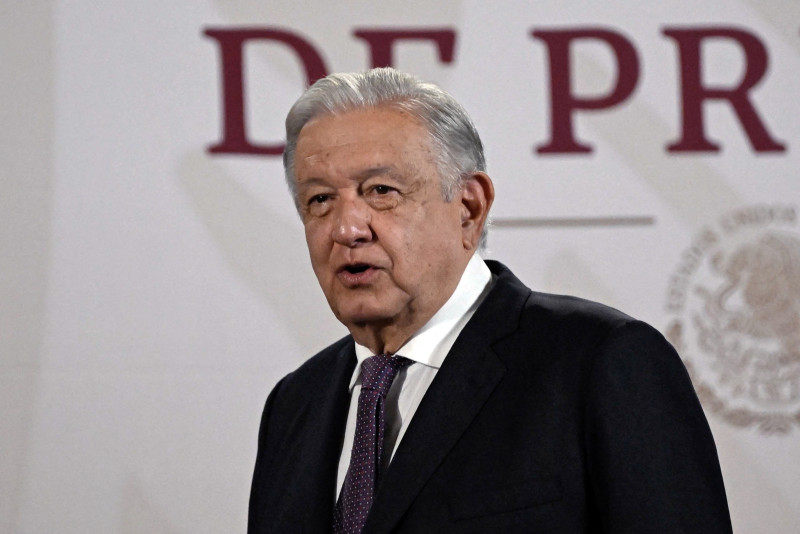 (FILES) Mexico's President Andres Manuel Lopez Obrador speaks during his usual morning press conference at the National Palace in Mexico City on July 26, 2024. - Mexican President Andres Manuel Lopez Obrador promised to stop the murder of journalists in Mexico, but weeks before leaving office, the reality is devastating: 39 murders in his six-year term and a bitter confrontation with the traditional media. (Photo by ALFREDO ESTRELLA / AFP)