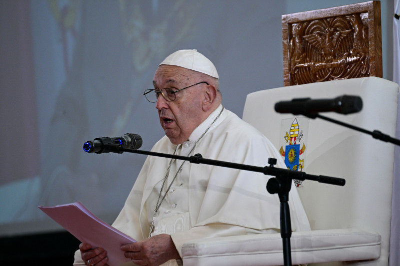 Pope Francis delivers his address next to Papua New Guinea's Governor General Bob Dadae (not pictured) at Government House in Port Moresby, Papua New Guinea on September 7, 2024. (Photo by Tiziana FABI / AFP)