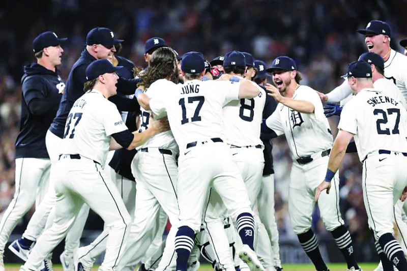 Los jugadores de los Tigres de Detroit celebran tras obtener la clasificación a la postemporada.