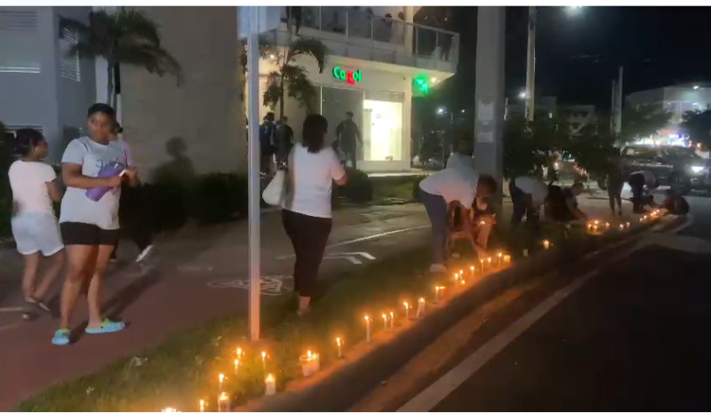 Encendido de velas en Ciudad Juan Bosch