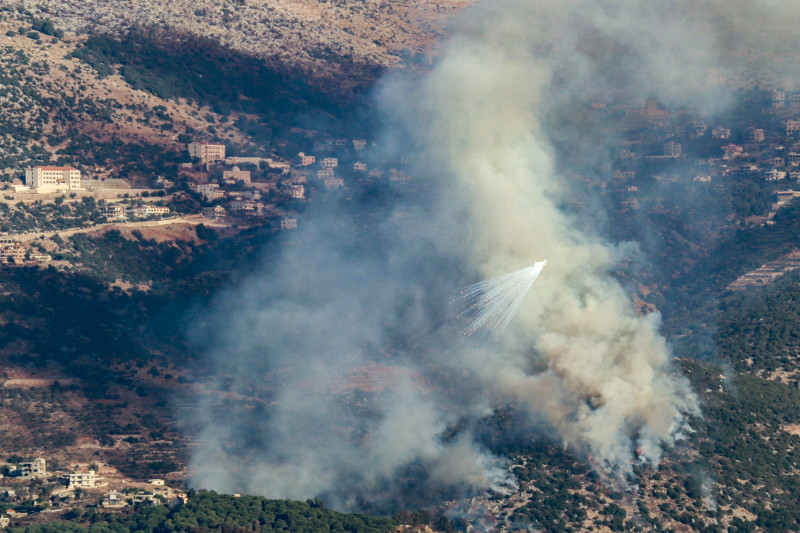 Smoke billows following Israeli bombardment on the village of Kfarhamam in southern Lebanon on October 19, 2024. - Israel expanded operations in Lebanon nearly a year after Hezbollah began exchanging fire in support of its ally, Hamas, following the Palestinian group's deadly attack on Israel on October 7, 2023. (Photo by AFP)