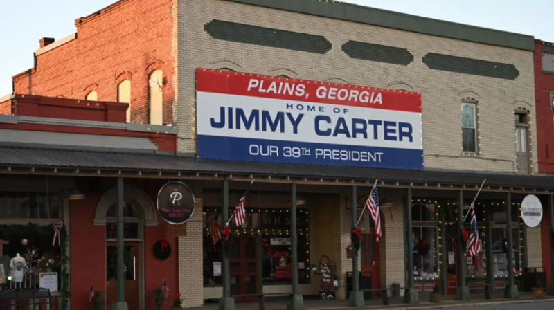 En el centro de Plains, Georgia, cuelga desde hace tiempo un cartel que anuncia a Jimmy Carter como 39º presidente.